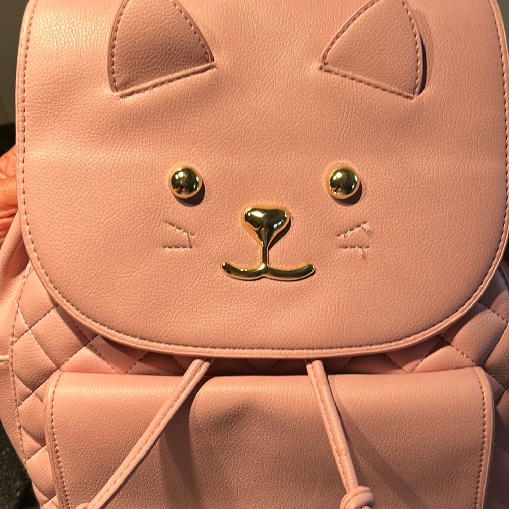 EUC Pink/Mauve Luv Betsey Johnson backpack and or purse.